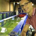 Image of Professor Chabchoub beside a wave tank